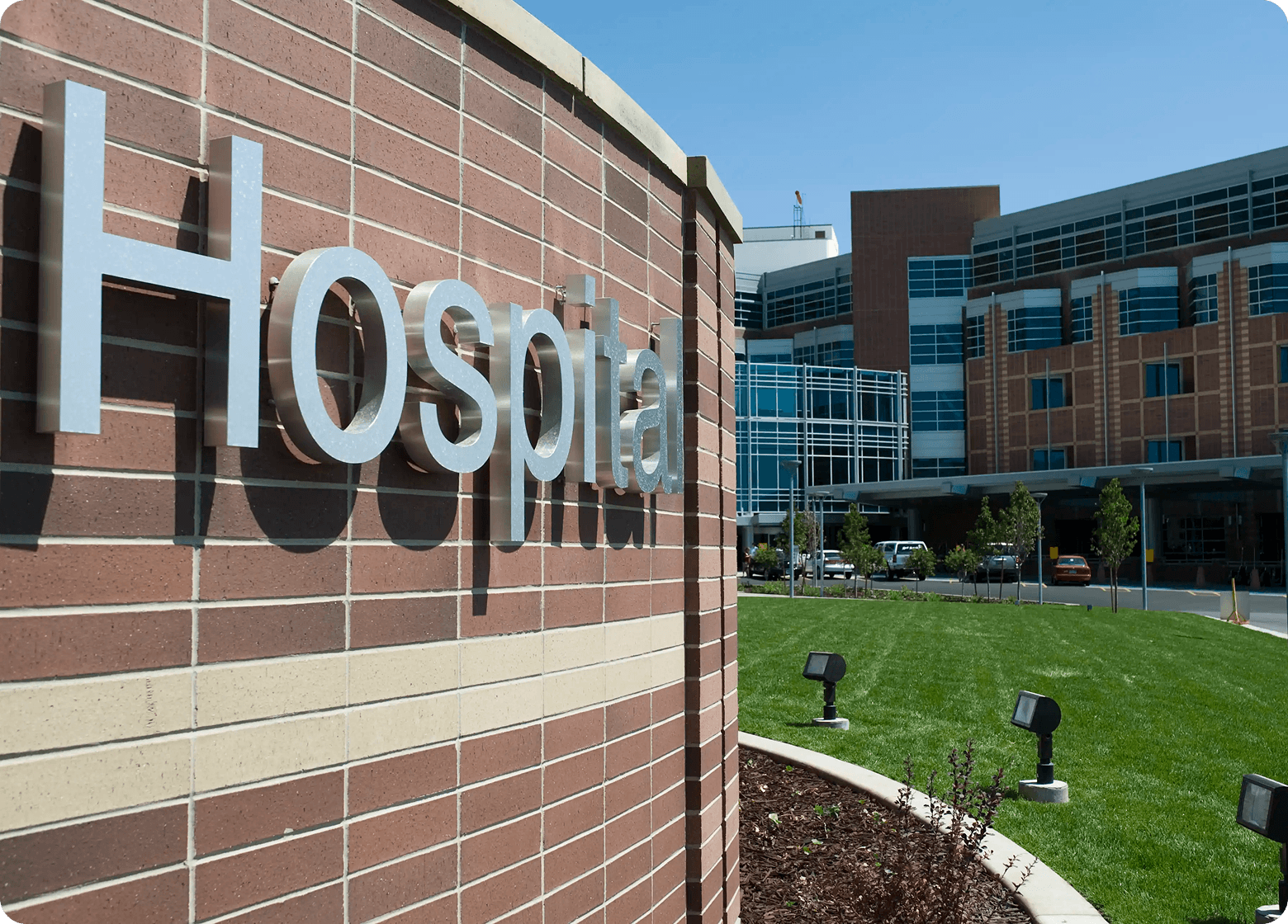 Hospital building exterior and entrance sign.