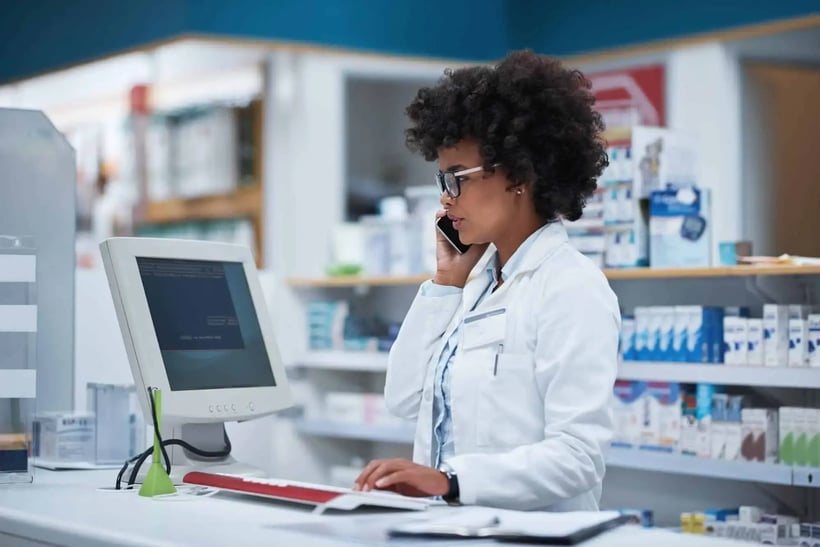 female pharmacist on the phone
