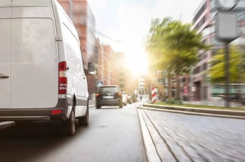 delivery truck on city road
